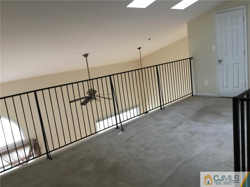 1132 Edpas Road, Unit 1132 New Brunswick, NJ 08901 - Photo 15 of 19 a view of a hallway