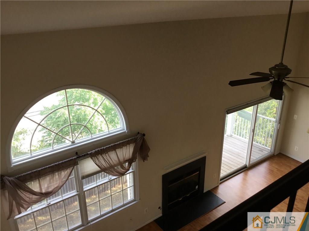 1132 Edpas Road, Unit 1132 New Brunswick, NJ 08901 - Photo 17 of 19 a view of an empty room with a window
