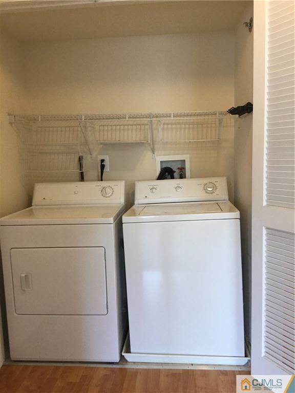 1132 Edpas Road, Unit 1132 New Brunswick, NJ 08901 - Photo 19 of 19 a utility room with dryer and washer