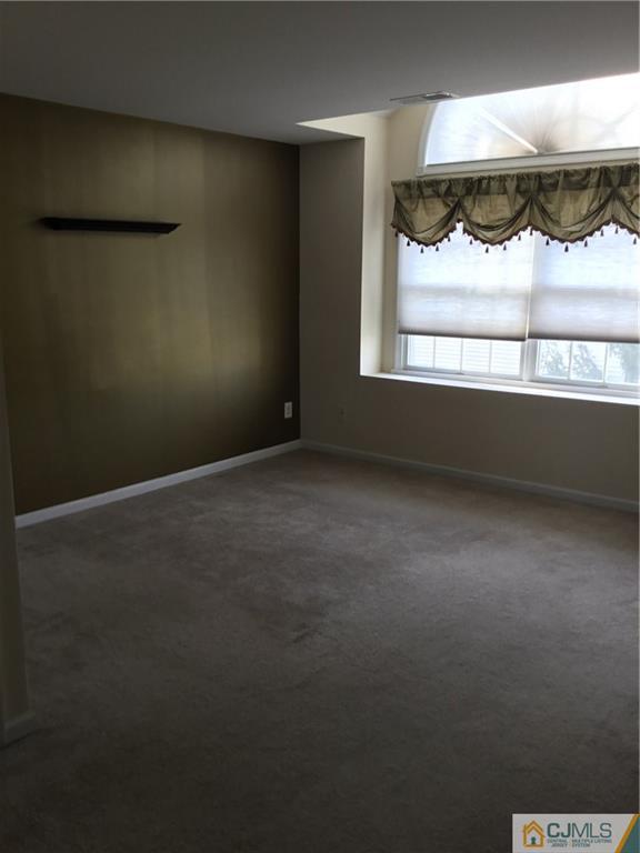 1132 Edpas Road, Unit 1132 New Brunswick, NJ 08901 - Photo 9 of 19 a view of a room with a window
