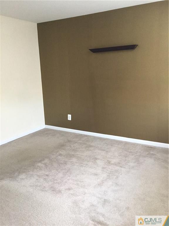 1132 Edpas Road, Unit 1132 New Brunswick, NJ 08901 - Photo 10 of 19 a view of an empty room