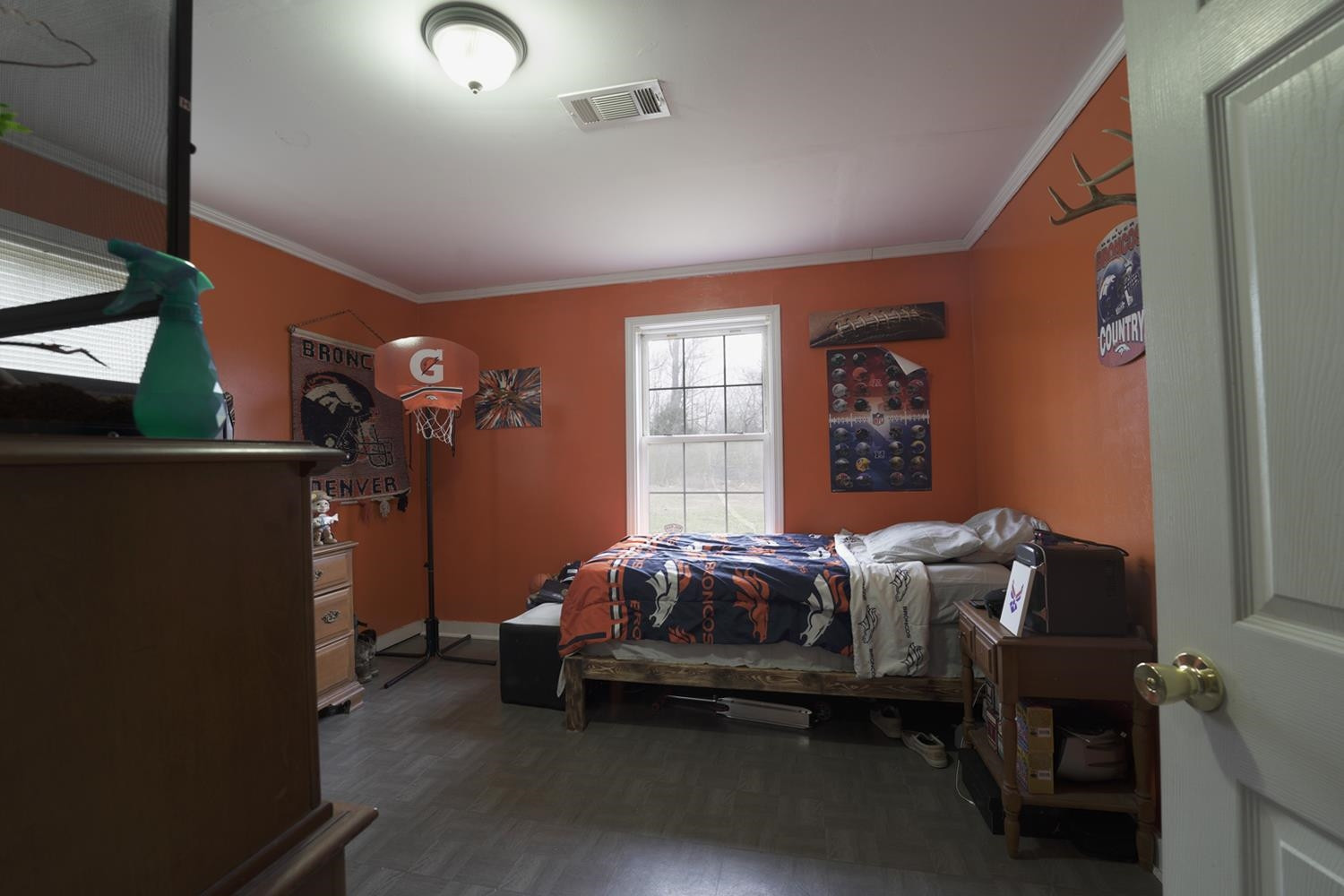 629 Brasfield Road Dresden, TN 38225 - Photo 12 of 21 a bed sitting in a room next to a window