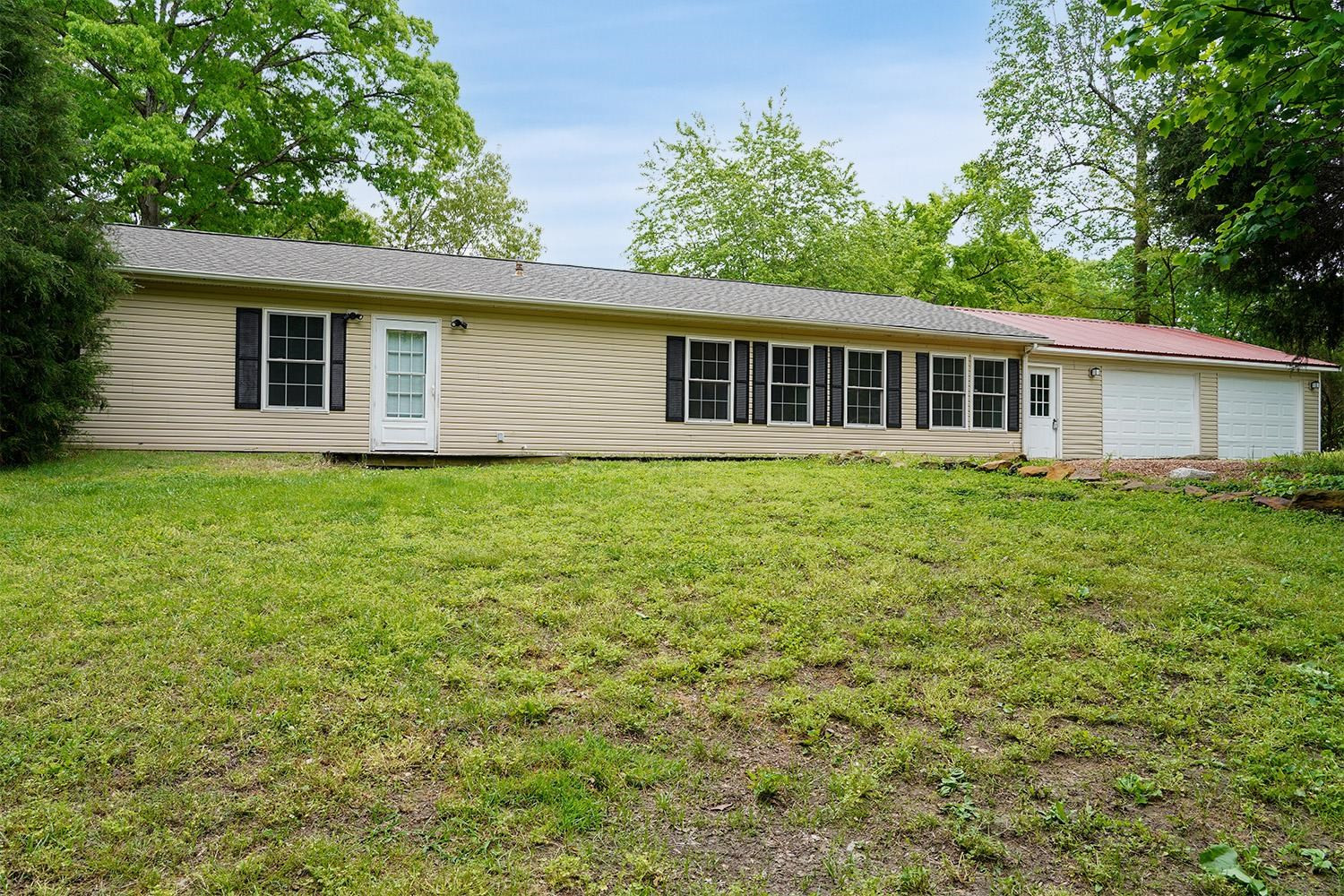 629 Brasfield Road Dresden, TN 38225 - Photo 2 of 21 a house view with a garden space