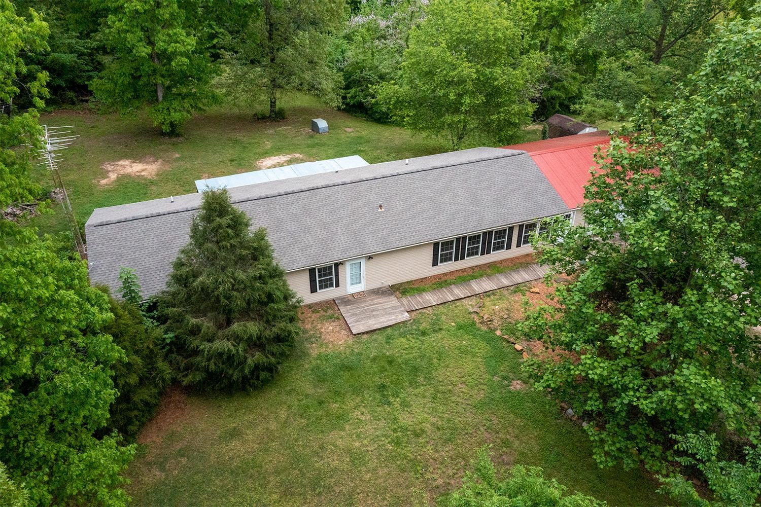 629 Brasfield Road Dresden, TN 38225 - Photo 3 of 21 an aerial view of a house with swimming pool a yard and lake view