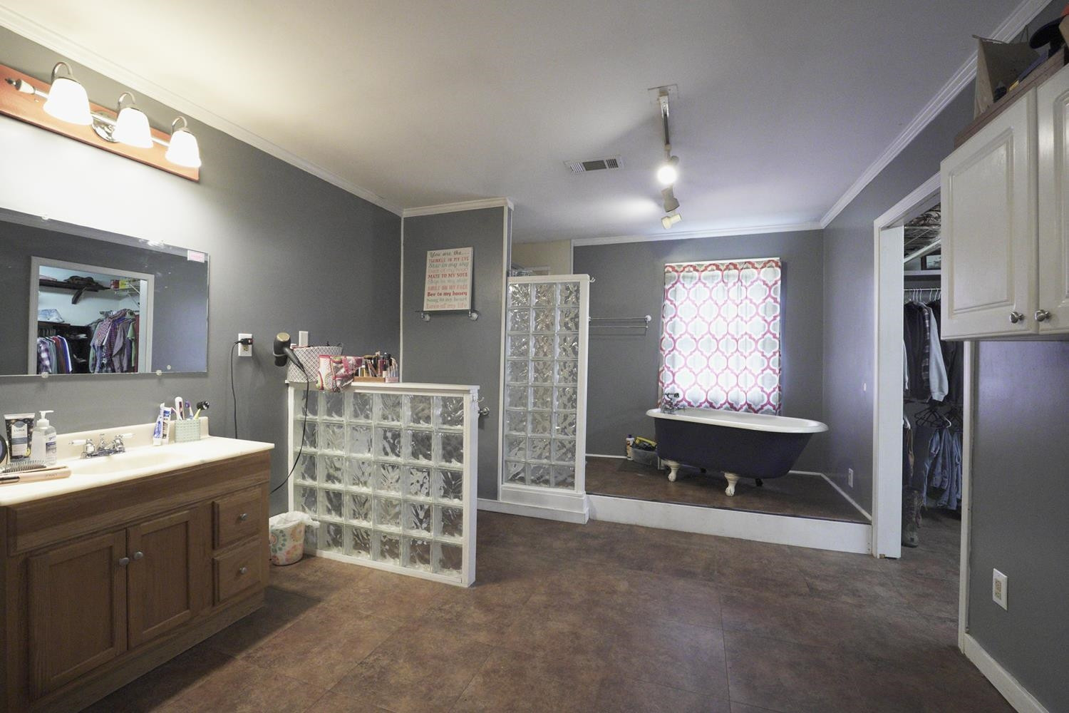 629 Brasfield Road Dresden, TN 38225 - Photo 9 of 21 a spacious bathroom with a double vanity sink and a mirror