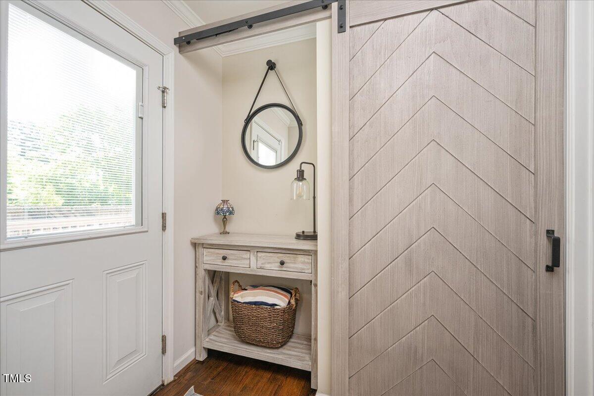 2210 Milburnie Road Raleigh, NC 27610 - Photo 18 of 30 a view of a livingroom with washer and dryer