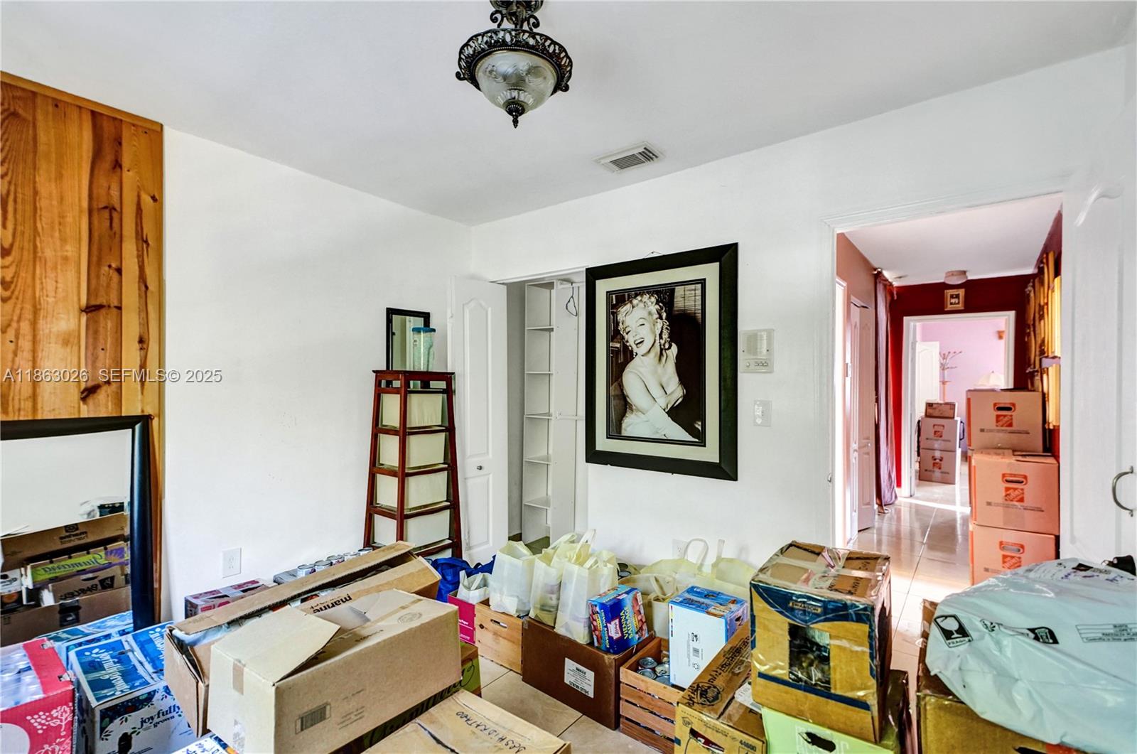 14824 Southwest 180th Street Miami, FL 33187 - Photo 17 of 49 a bedroom with furniture and a window