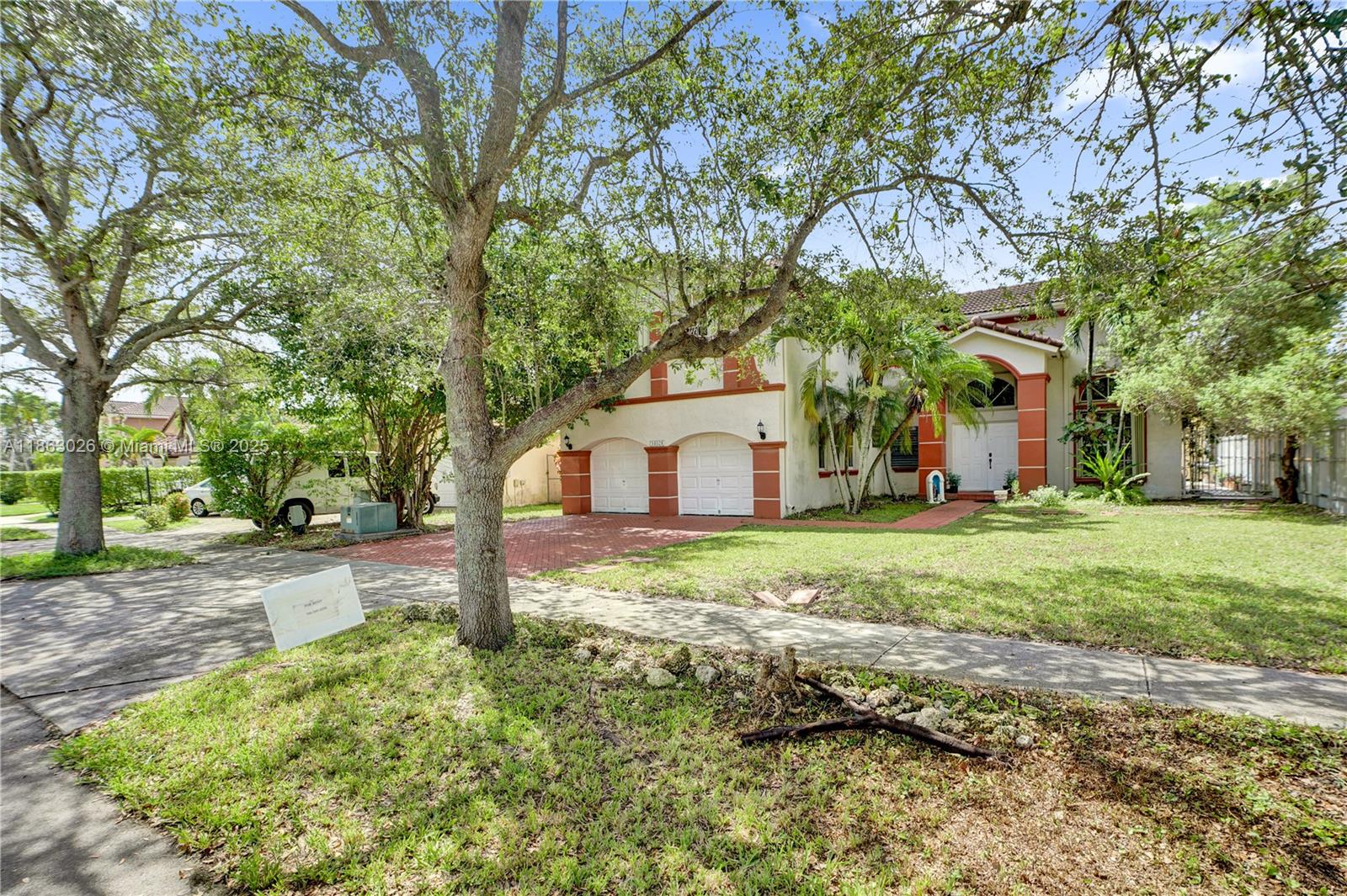 14824 Southwest 180th Street Miami, FL 33187 - Photo 2 of 49 a view of a house with a yard