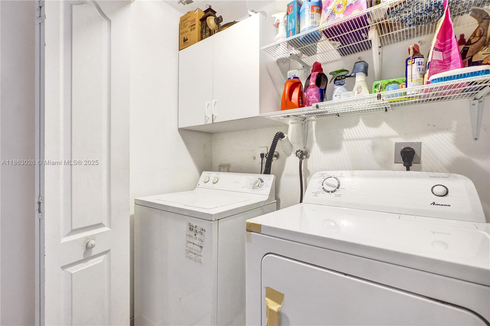 14824 Southwest 180th Street Miami, FL 33187 - Photo 26 of 49 a utility room with dryer and washer