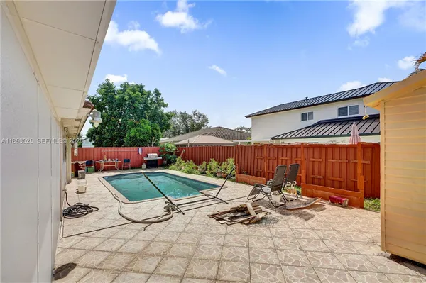a view of outdoor space with seating area