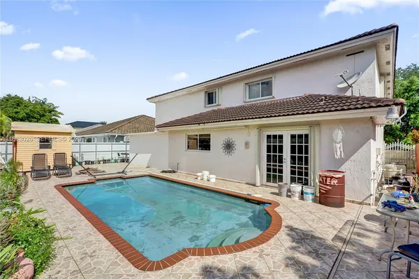 front view of a house with a patio