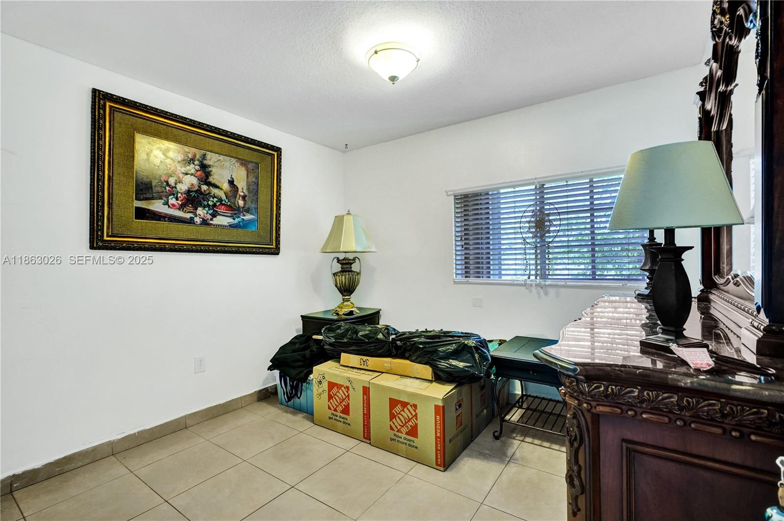 14824 Southwest 180th Street Miami, FL 33187 - Photo 48 of 49 a room with furniture and window