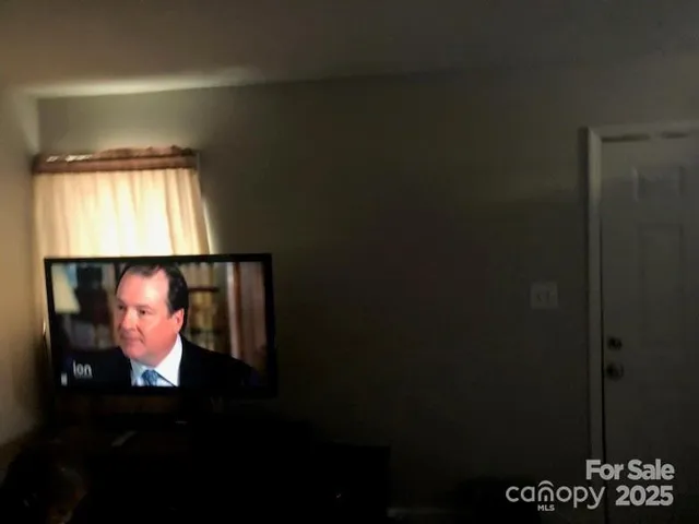 a room with furniture and window