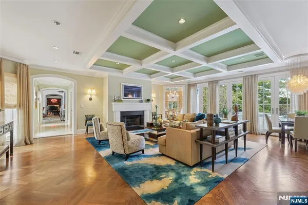 a spacious bedroom with a bed and a fireplace