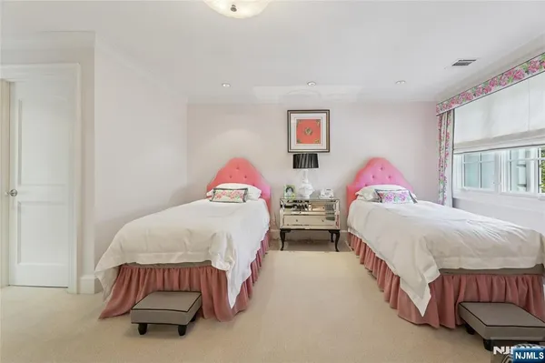 a kitchen with stainless steel appliances granite countertop a sink and a large window