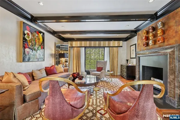 a kitchen with stainless steel appliances granite countertop a sink and stove