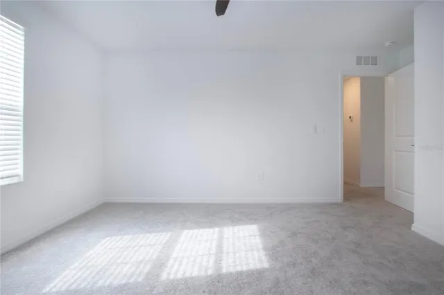 a view of a house with a yard and garden