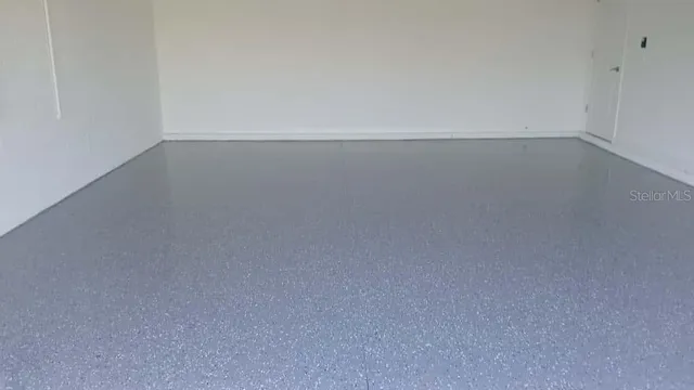 a living room with a couch and a table