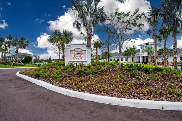 a kitchen with a table and chairs in it