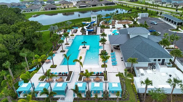 a view of a patio with a table and chairs