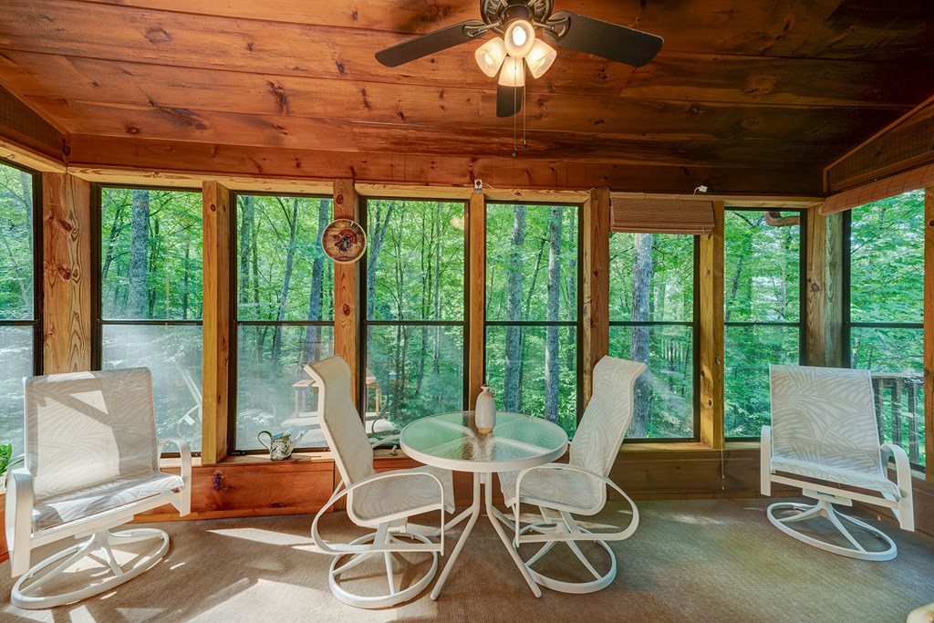 584 Laurel Ridge Drive Blue Ridge, GA 30513 - Photo 14 of 49 a work room with large windows and furniture