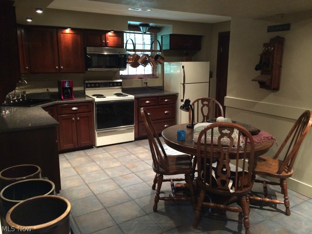 7052 Drake State Line Road Burghill, OH 44404 - Photo 19 of 22 Full Kitchen in lower level.