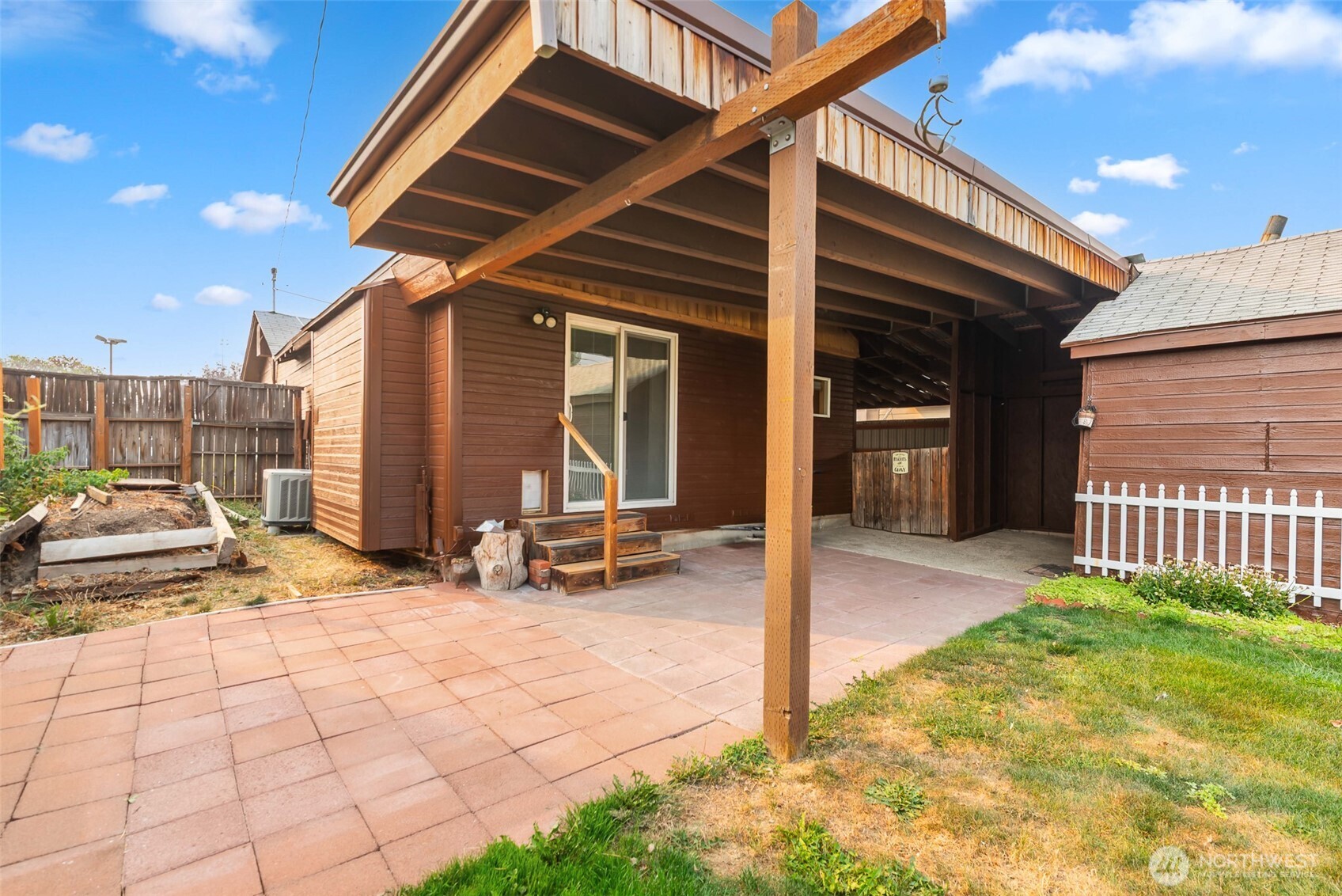 203 Fuller Street Wenatchee, WA 98801 - Photo 21 of 29 a view of a house with backyard and sitting area