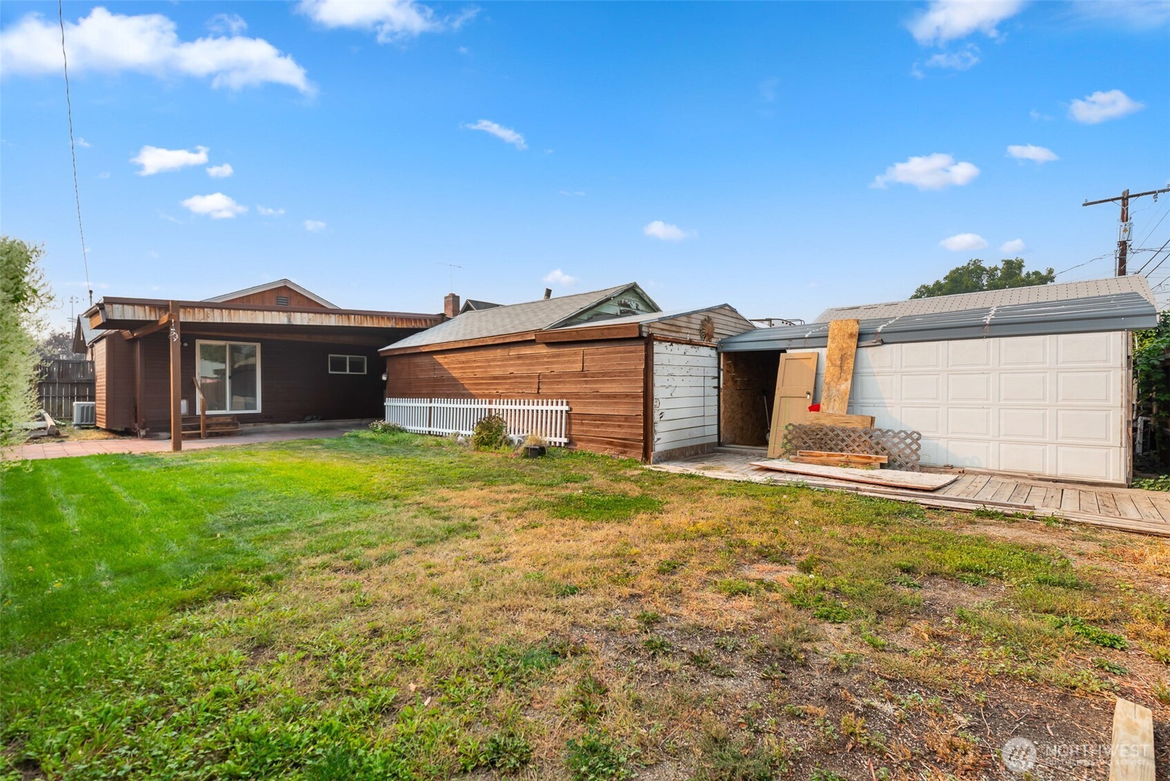 203 Fuller Street Wenatchee, WA 98801 - Photo 25 of 29 a view of a yard in front of a house with a yard