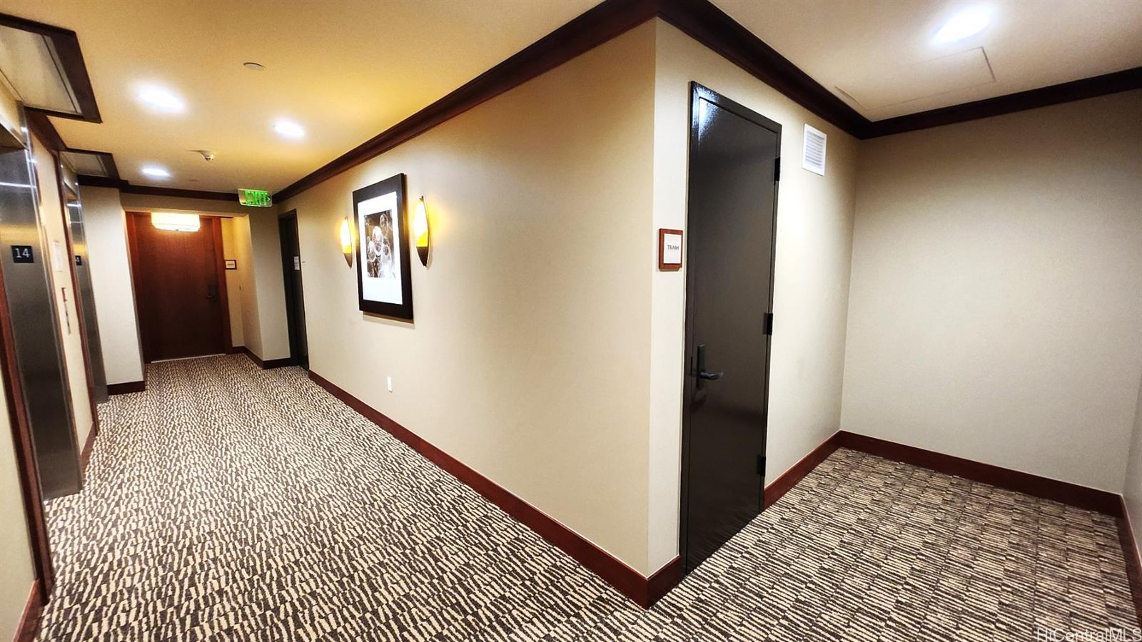92-104 Waialii Place, Unit OPH 1401 Kapolei, HI 96707 - Photo 2 of 24 a view of hallway with a rug and a window