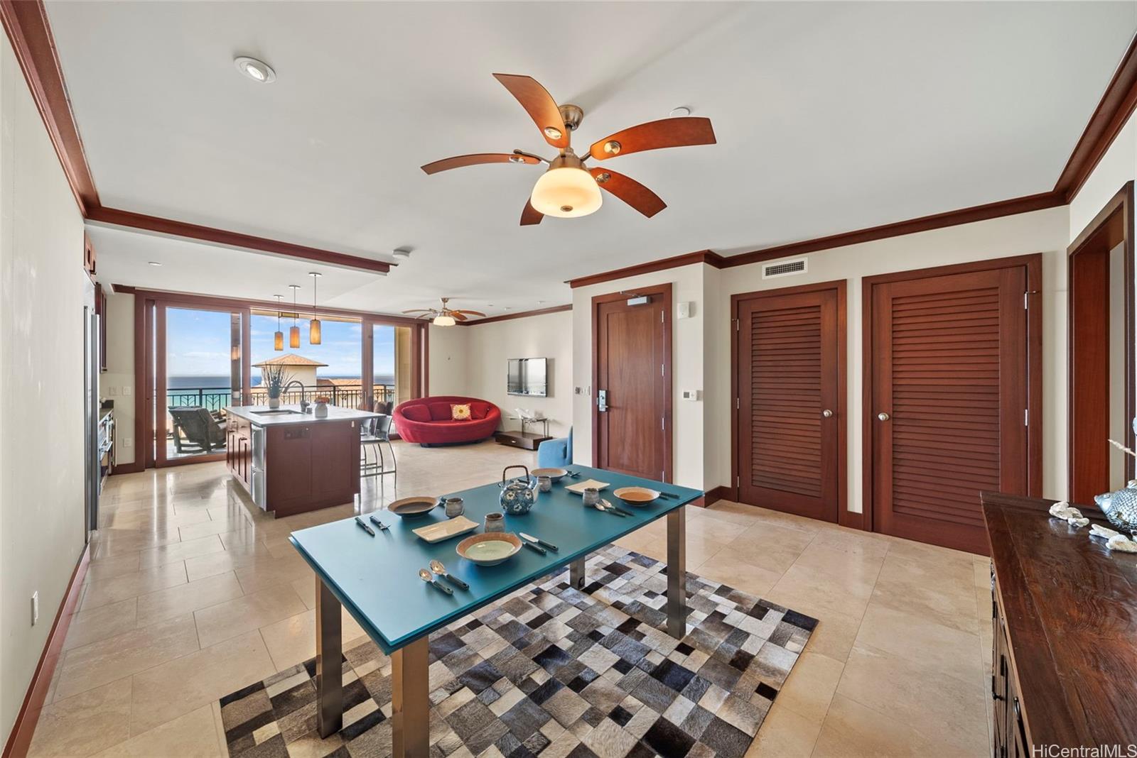 92-104 Waialii Place, Unit OPH 1401 Kapolei, HI 96707 - Photo 4 of 24 a living room with furniture and window