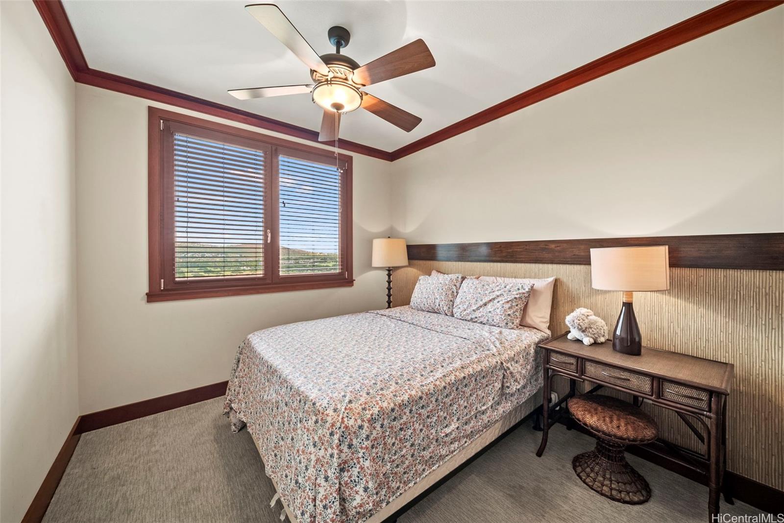 92-104 Waialii Place, Unit OPH 1401 Kapolei, HI 96707 - Photo 10 of 24 a bedroom with a bed a couch and a ceiling fan