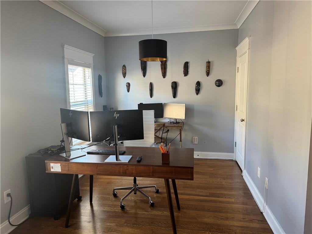 655 Mead Street Southeast, Unit 28 Atlanta, GA 30312 - Photo 19 of 42 a workspace with furniture and wooden floor