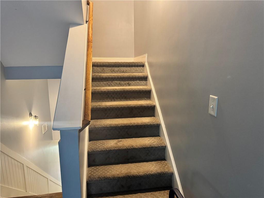 655 Mead Street Southeast, Unit 28 Atlanta, GA 30312 - Photo 24 of 42 a view of staircase with white walls