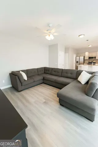 a living room with furniture and a couch