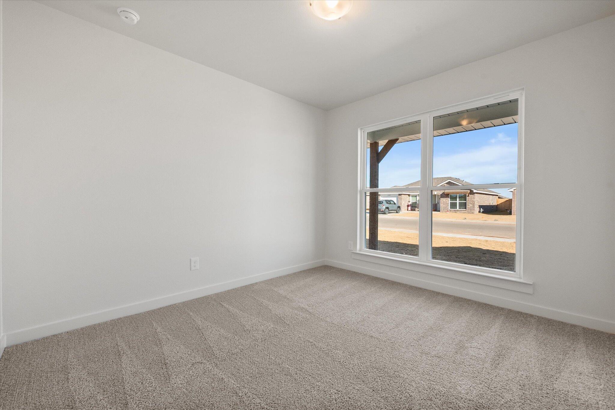 6308 Volney Avenue Lubbock, TX 79407 - Photo 15 of 19 a view of empty room with window