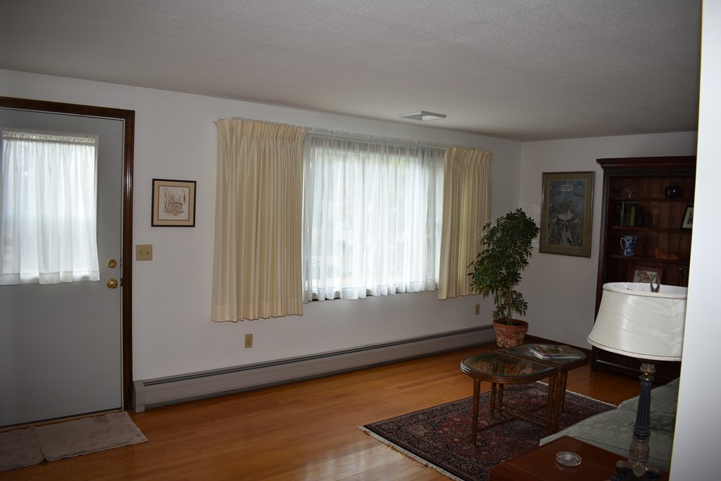 87 Logtown Road Amherst, MA 01002 - Photo 18 of 30 a living room with furniture and a window