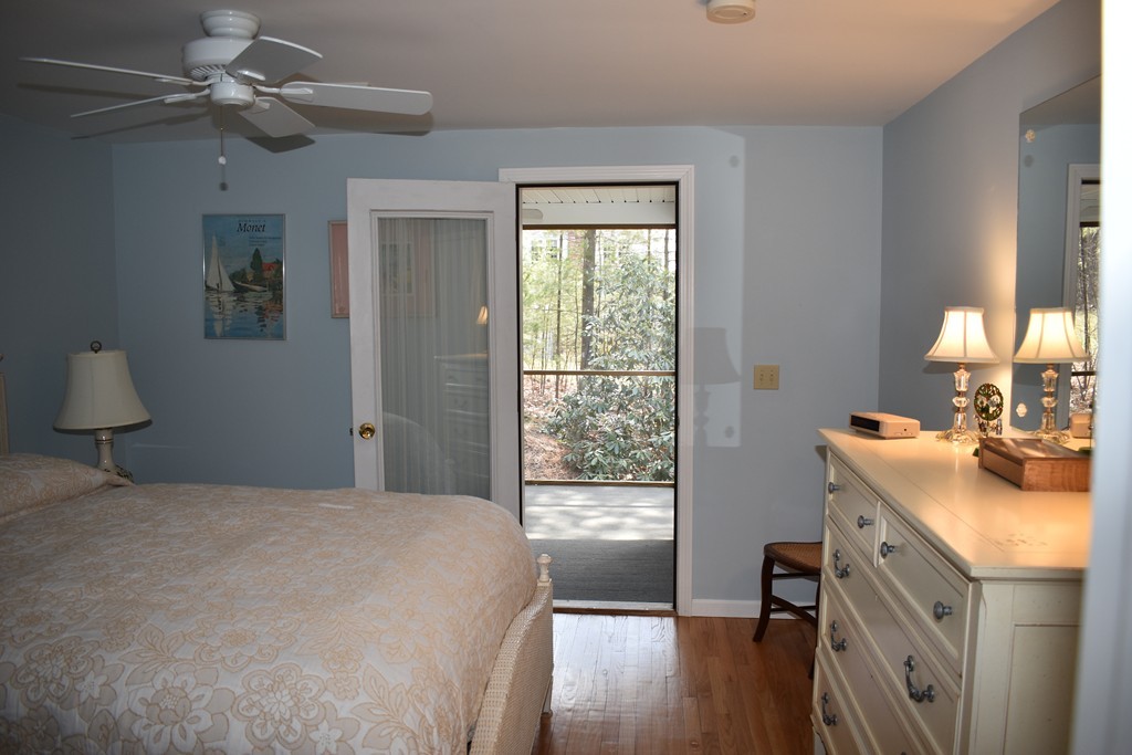 87 Logtown Road Amherst, MA 01002 - Photo 20 of 30 a bedroom with a bed dresser and a window