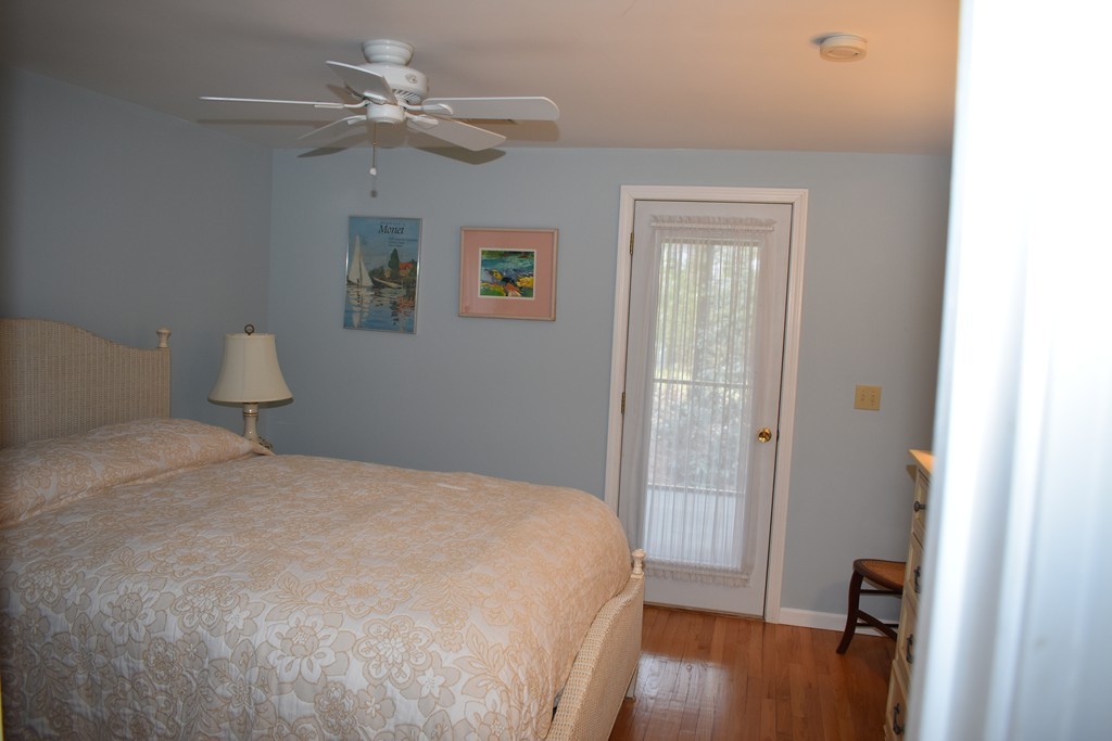 87 Logtown Road Amherst, MA 01002 - Photo 21 of 30 a bedroom with a bed and a window