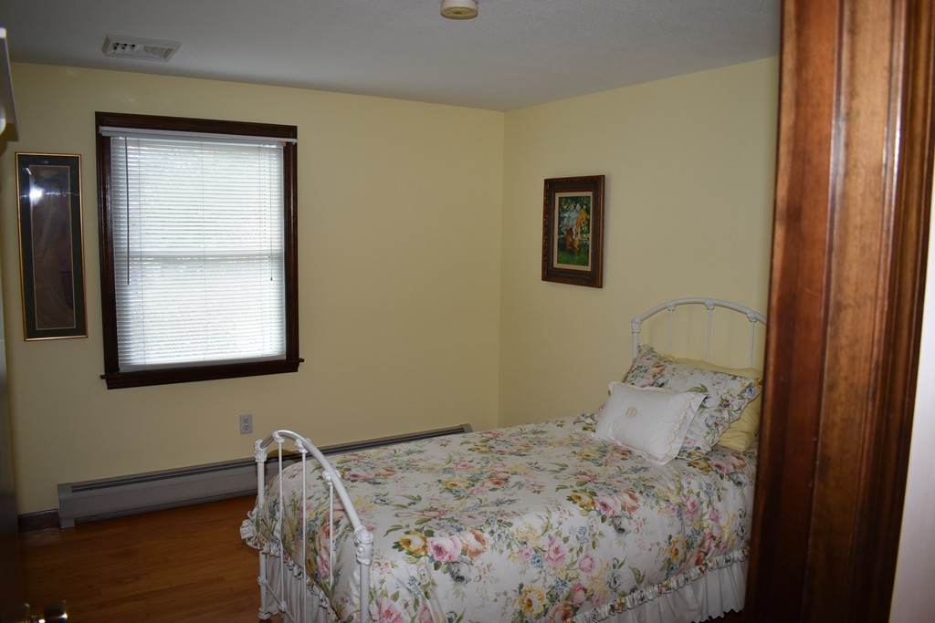 87 Logtown Road Amherst, MA 01002 - Photo 24 of 30 a bedroom with a bed and a window