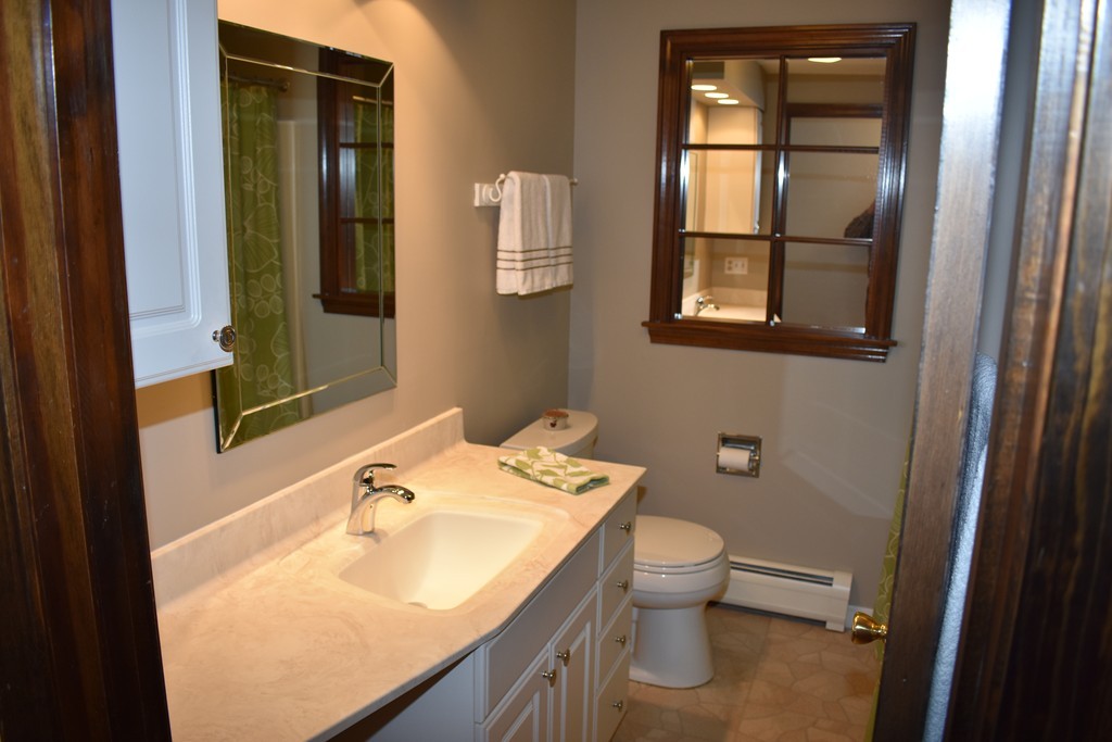 87 Logtown Road Amherst, MA 01002 - Photo 29 of 30 a bathroom with a sink toilet and mirror