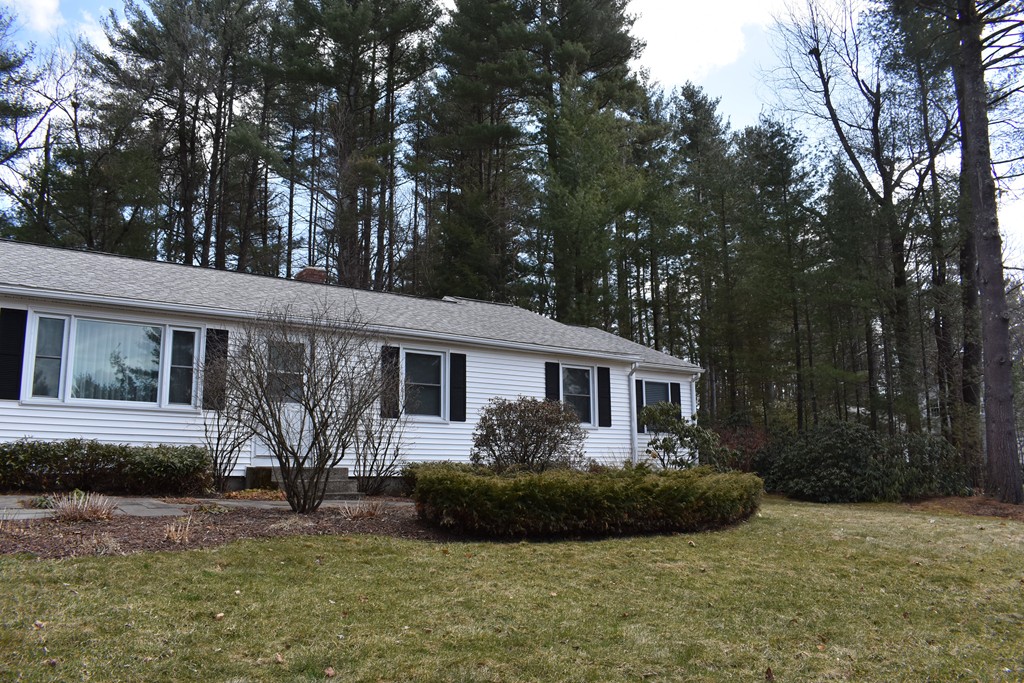 87 Logtown Road Amherst, MA 01002 - Photo 4 of 30 a view of a house with backyard and sitting area