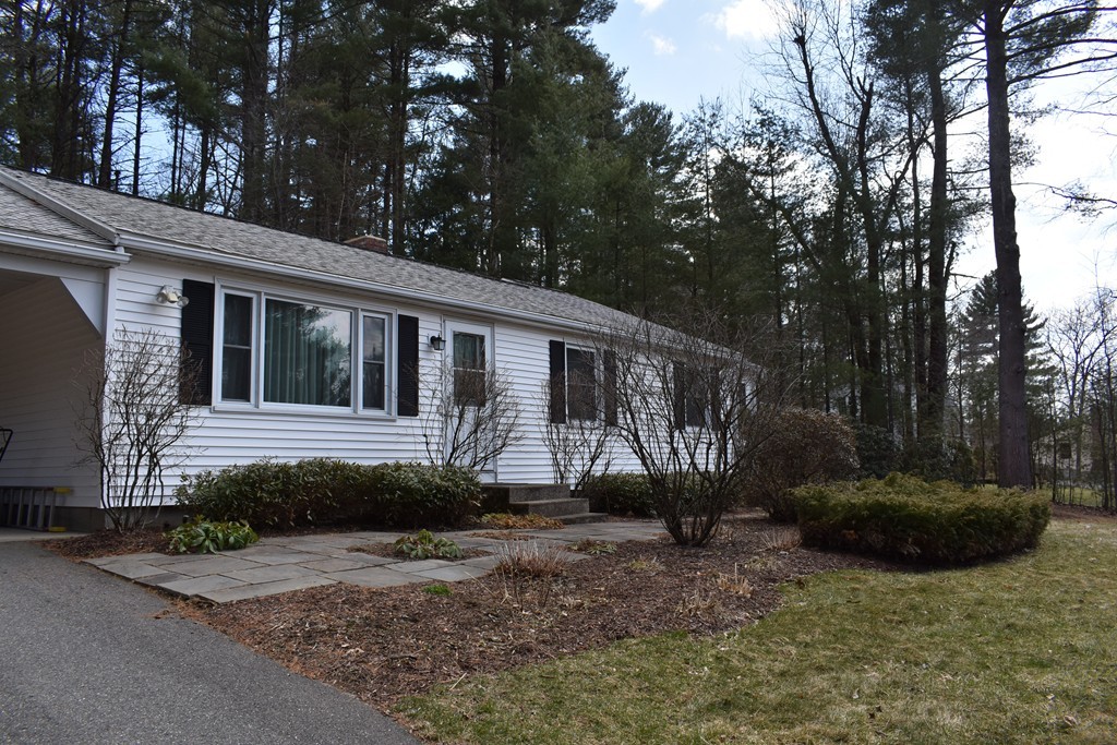 87 Logtown Road Amherst, MA 01002 - Photo 5 of 30 a view of a house with a yard