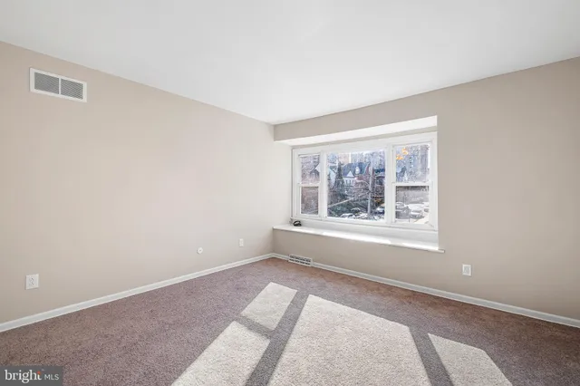 an empty room with closet