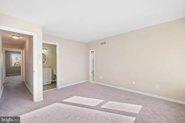 a bathroom with a sink a toilet and bathtub