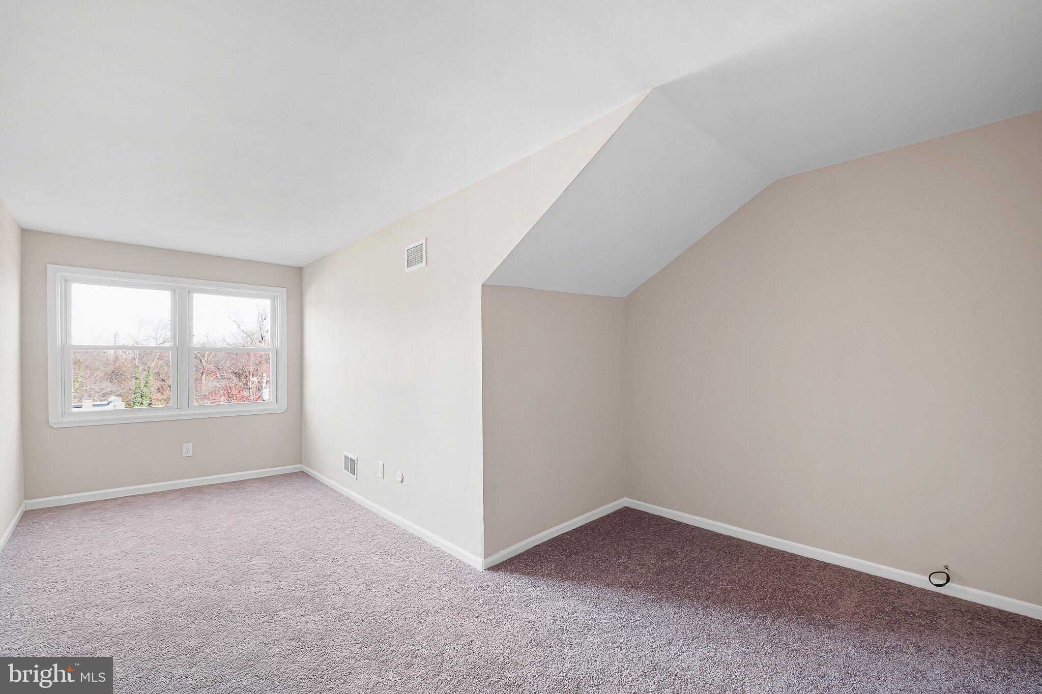 1301 Shallcross Avenue Wilmington, DE 19806 - Photo 22 of 33 an empty room with windows