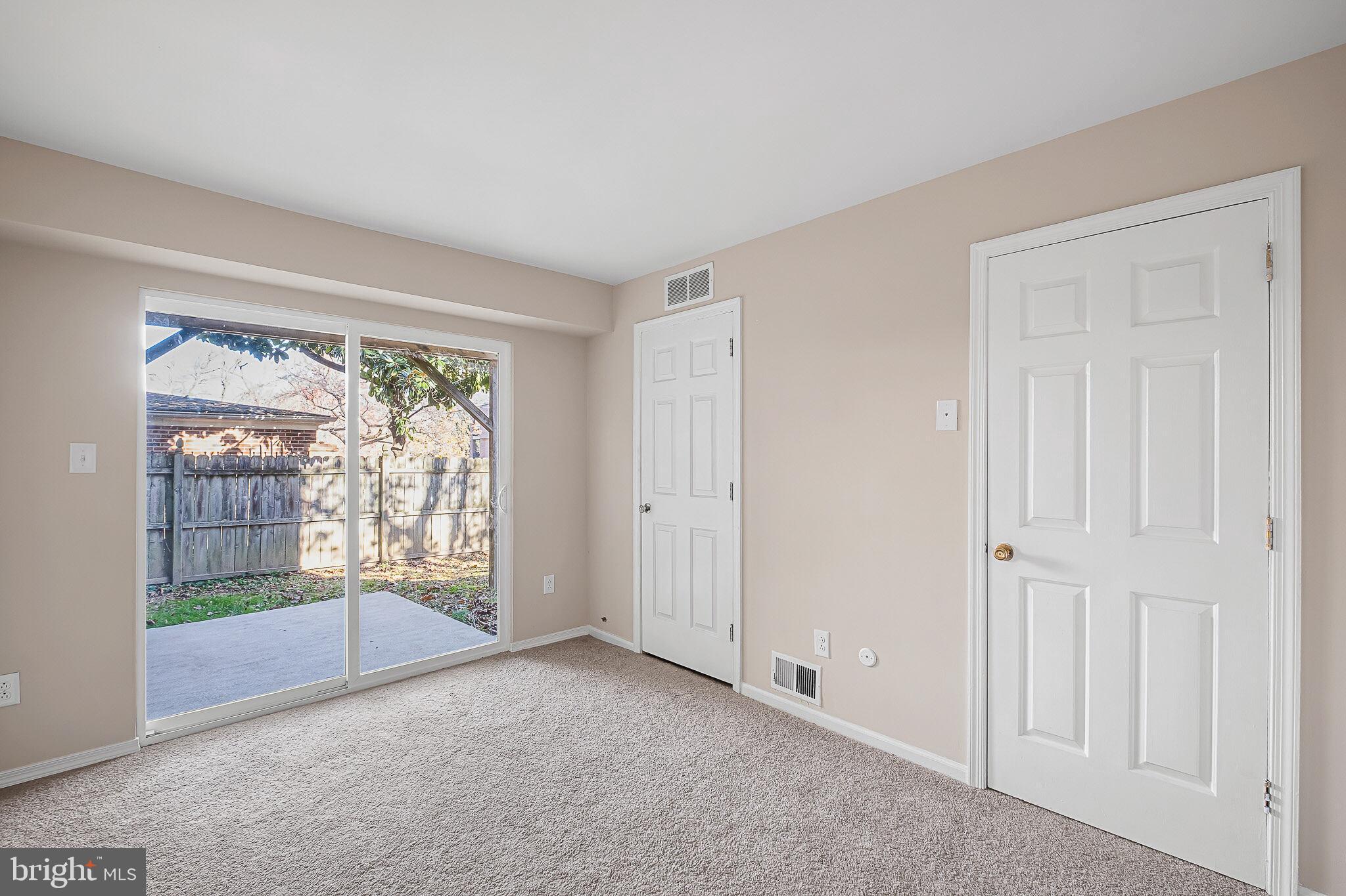 1301 Shallcross Avenue Wilmington, DE 19806 - Photo 25 of 33 a view of an empty room with glass door