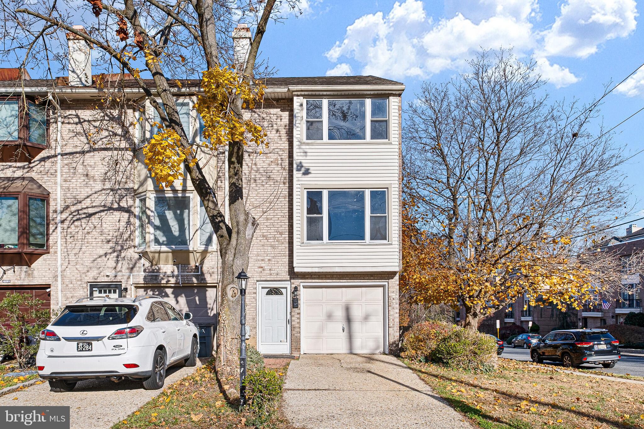 1301 Shallcross Avenue Wilmington, DE 19806 - Photo 5 of 33 a front view of a house with a yard