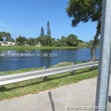 a view of a lake from a yard