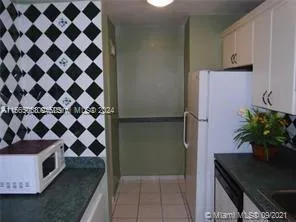 a view of a room with a large window