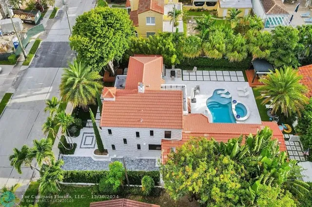a view of a swimming pool and lounge chair